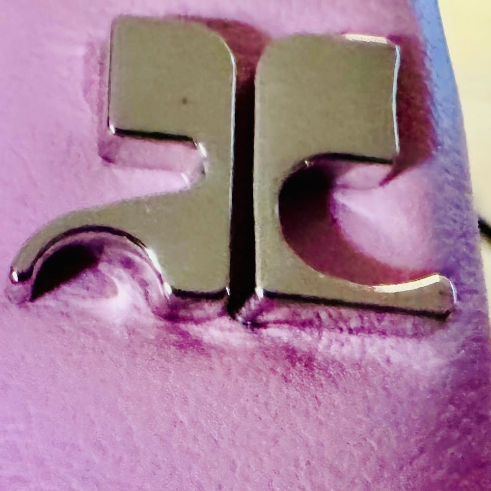 Purple Clutch with Silver Logo Accent.